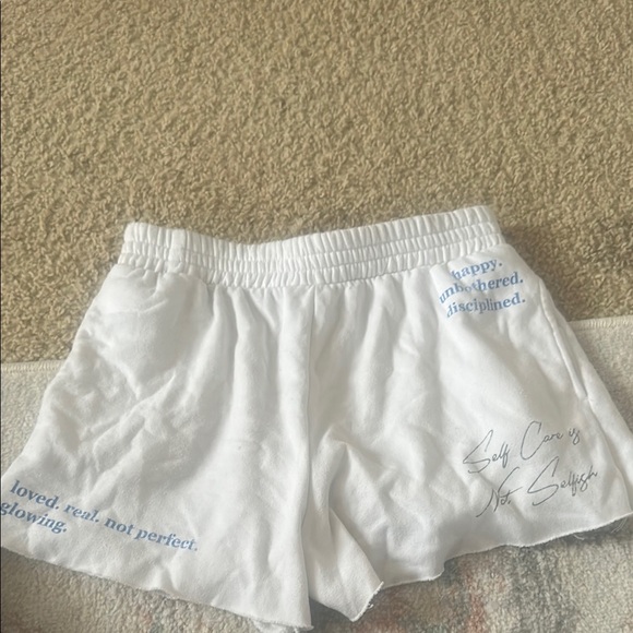White Shorts with Blue Text - Picture 1 of 1